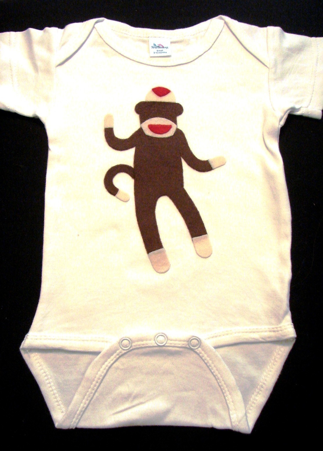 http://www.kitschy-kitschy-coo.com/uploaded_images/sock-monkey-hand-made-felt-applique-childrens-clothing-755740.jpg